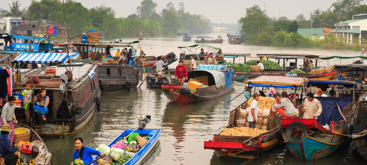 The floating market is a unique attraction of the Mekong Delta region. With a majority of the area are rivers and canals, trading by boats becomes a habit of the locals